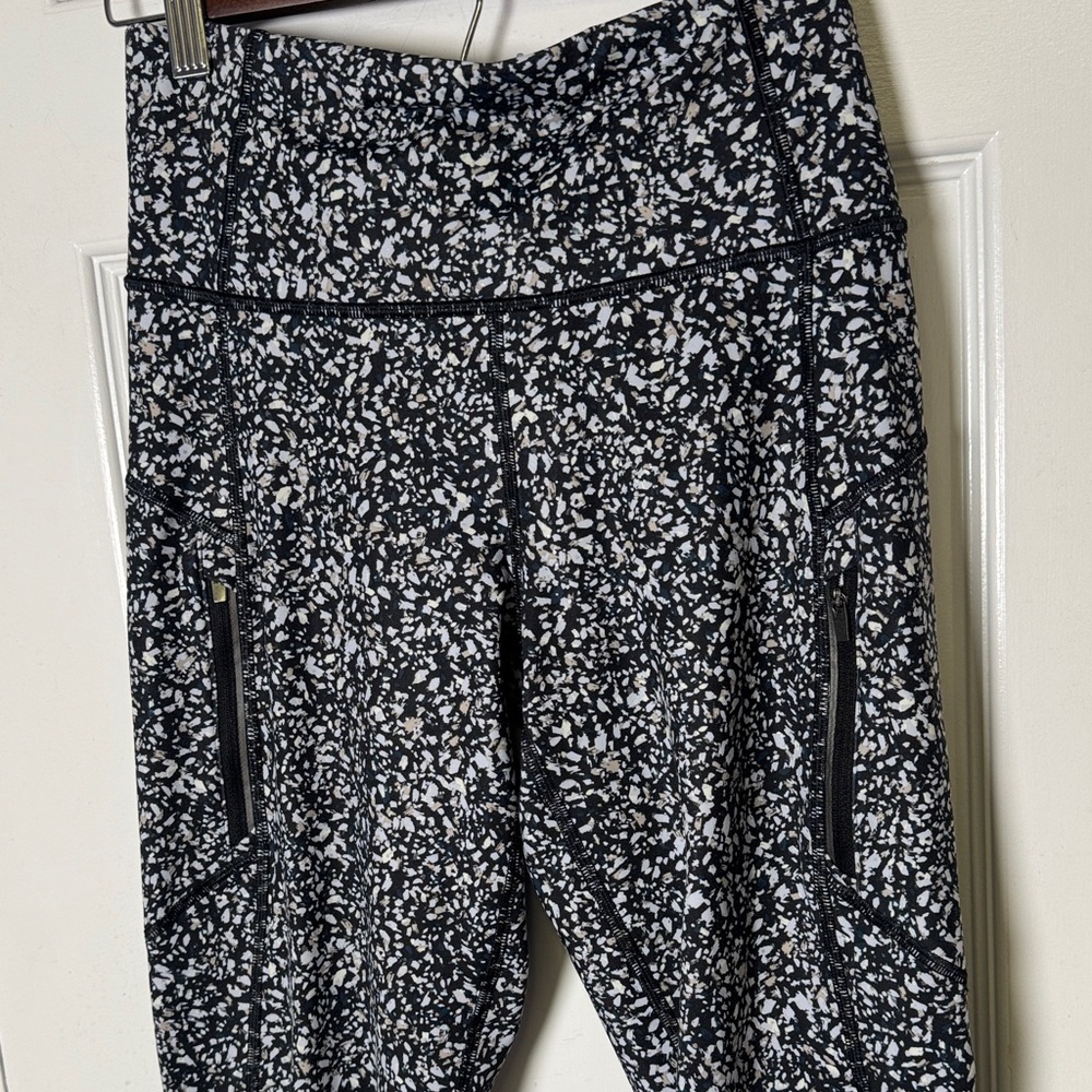 Athleta Rainier Tight Fleece Lined Leggings Zip Pockets Black Print Size S - Picture 4 of 10